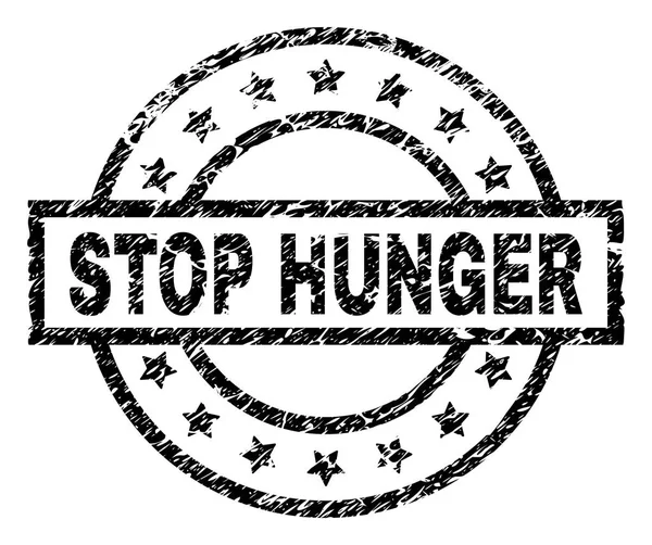 Грандж текстурований STOP HUNGER штамп ущільнення — стоковий вектор