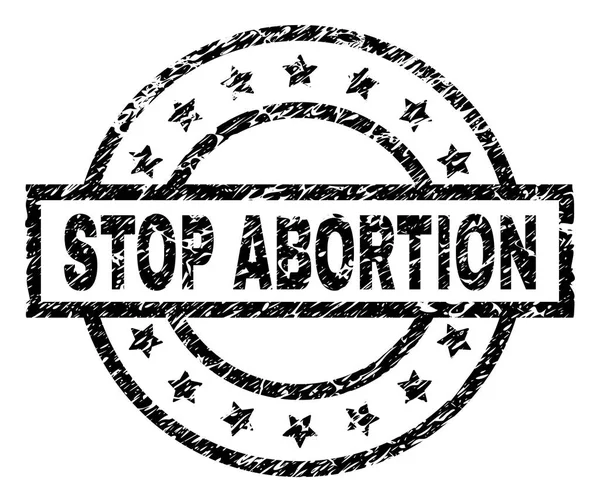Selo de carimbo texturizado rasgado STOP ABORTION — Vetor de Stock