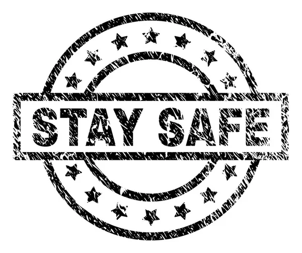 Grunge texturizado STAY SAFE selo — Vetor de Stock