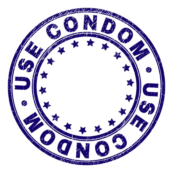 Grunge texturerat använda kondom runda stämpelplatta — Stock vektor