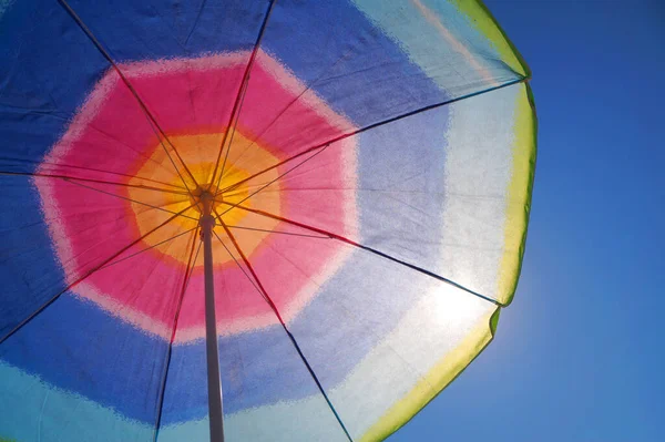 Sun Shines Multi Colored Beach Umbrella View Copy Space — Stock Photo, Image