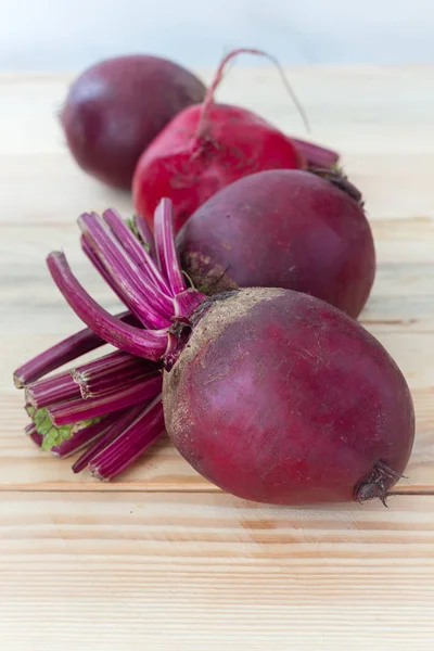 Red beet or beetroot on the wooden table.