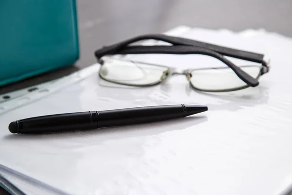 Black Rimmed Optical Glasses Black Pen Documents Grey Marble Background Stock Image