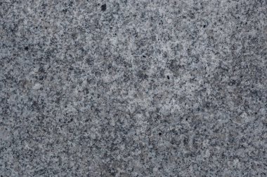 Doku giyilen gri çimento kaplama