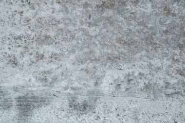 Doku giyilen gri çimento kaplama