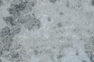 Doku giyilen gri çimento kaplama