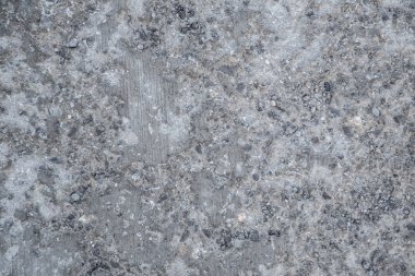 Doku giyilen gri çimento kaplama