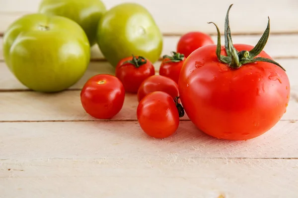 Different Varieties Tomatoes Wooden Background — Stock Photo, Image