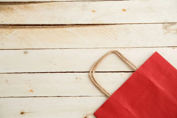 Cardboard bags on a wooden isolated background. Top view