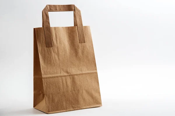 Cardboard bags on white isolated background. Front view