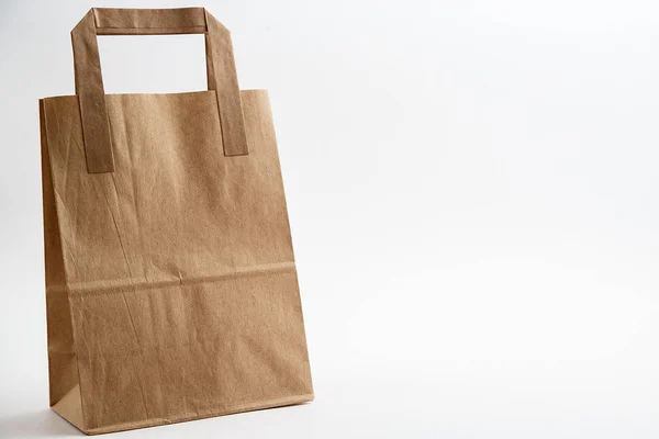 Cardboard bags on white isolated background. Front view