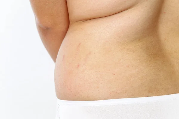 Mujer gorda joven en lencería sobre fondo blanco aislado. lado v — Foto de Stock