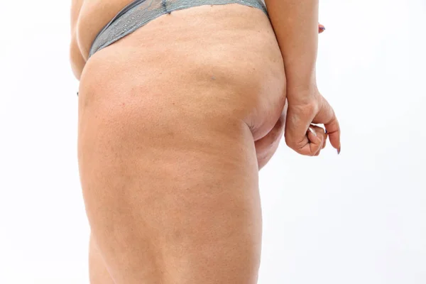 Giovane donna sovrappeso in lingerie su backgroun isolato bianco — Foto Stock
