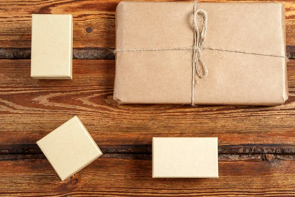gift Packed in eco-friendly biodegradable cardboard on dark old