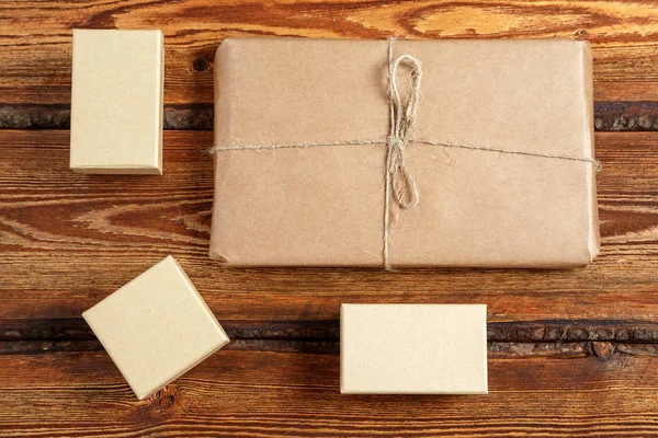 gift Packed in eco-friendly biodegradable cardboard on dark old