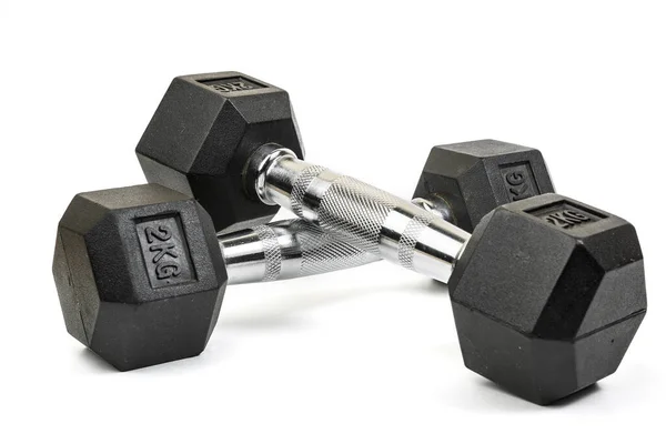 Sports dumbbells with black rubber handle on white isolated back — Stock Photo, Image