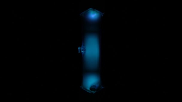 Quartz medical lamp on a black background — Stock Video