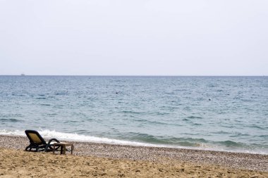 Plaj şemsiyesi altında eğlence