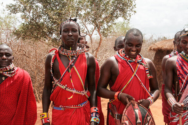 Kenya, Tsavo National Park, 03/20/2018 - Masai people in their village in traditional costume