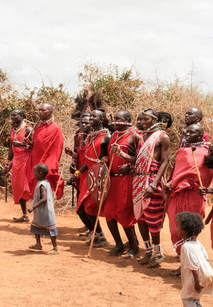 Kenya, Tsavo National Park, 03/20/2018 - Masai people in their village in traditional costume