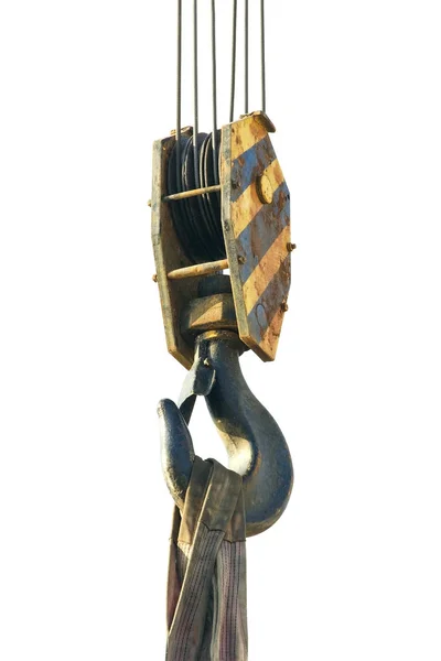 The hook of the cargo crane is black, yellow with slings. Isolated on white background
