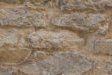 Taştan duvar dokusu çimento ile gümrüklü.