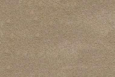 Kumlu plaj yüzeyi. Grenli doku