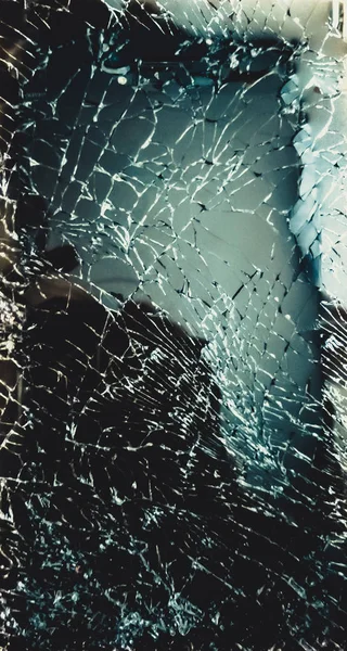 Top view cracked broken mobile screen glass.