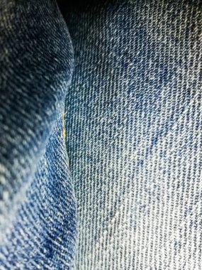 Denim desen, kumaş arka plan bulanıklık ve netlik alanları ile.