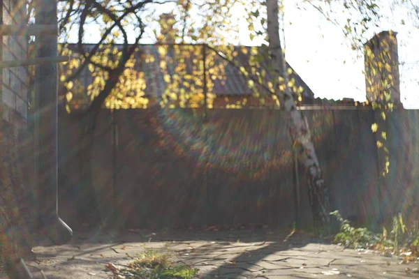 old roof with chimney, drain pipe on the corner of the house