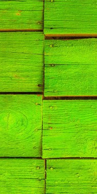 Dikişleri arka plan ile doymuş kireç eski ahşap plakalar.