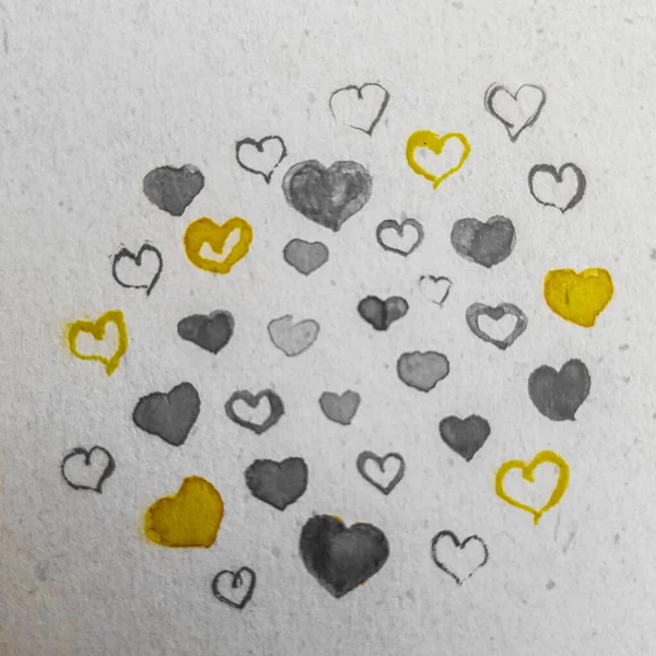 Liebeskarte mit kleinen grauen und gelben Herzen — Stockfoto