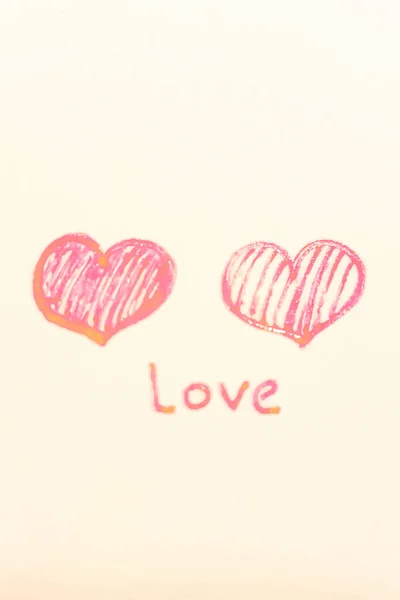 Två hjärtan målade med pensel på alla hjärtans dag firande. — Stockfoto