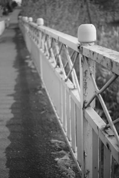 Old bridge with fencing and trowalk, bw — стоковое фото