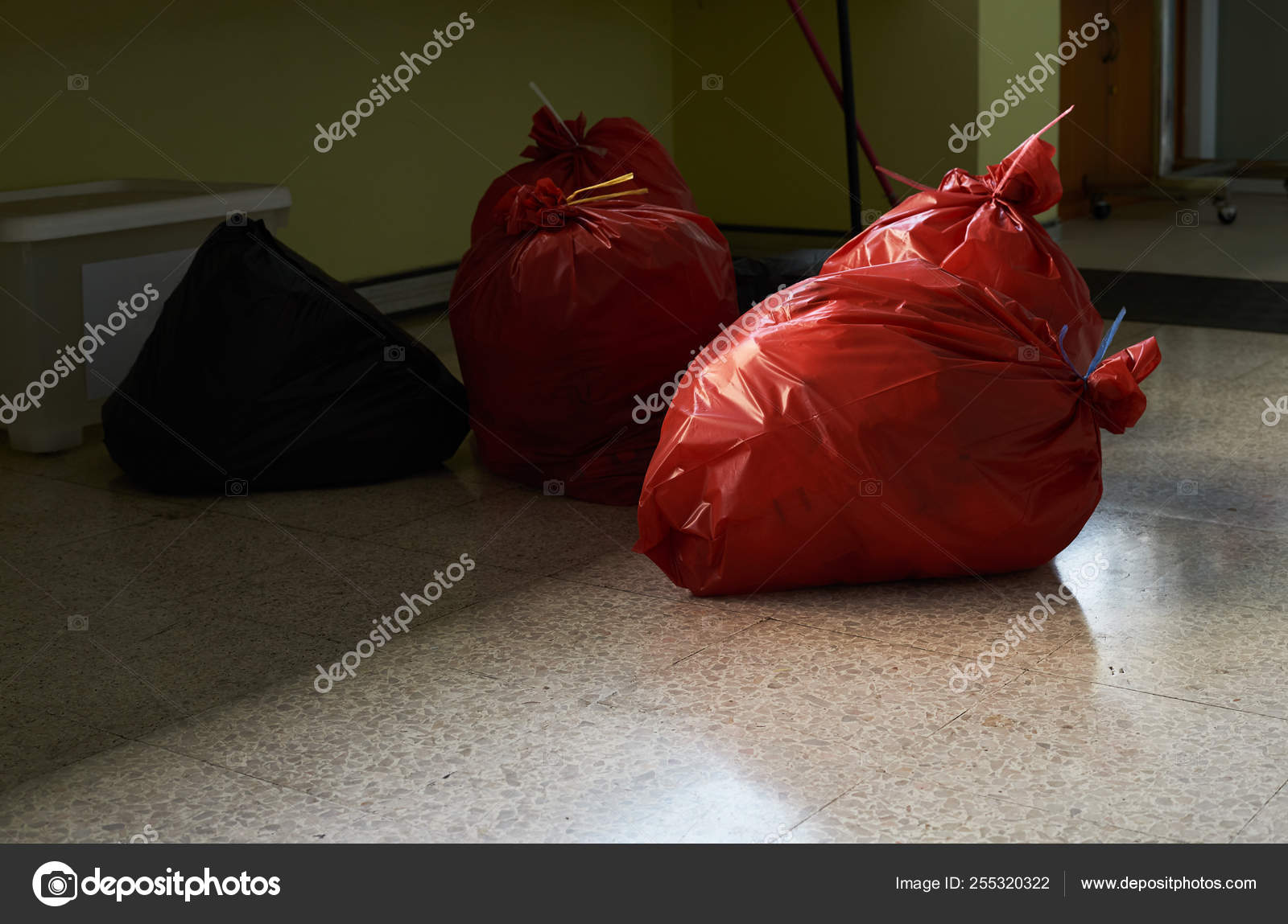 Red and black garbage bags in the hospital Stock Photo by ©srikijt