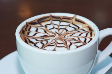 Cappuccino lezzetli bir fincan yakından görünümü 