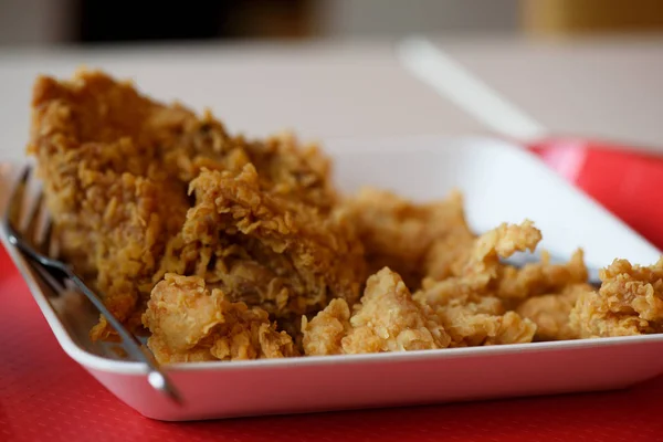 A plate of fried chickens on the table — Stock Photo, Image