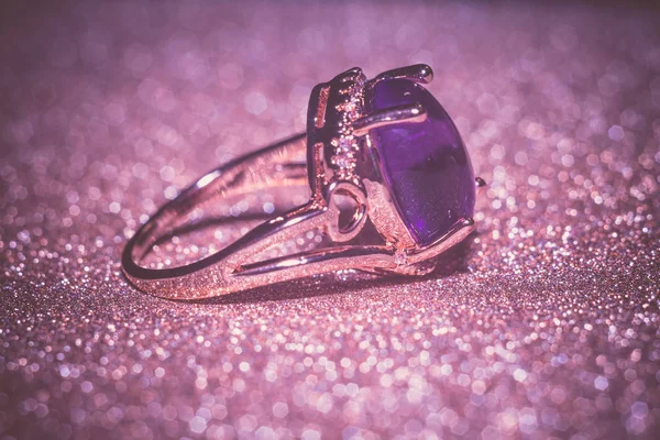 Fashion rose gold ring made of natural purple amethyst gemstone.