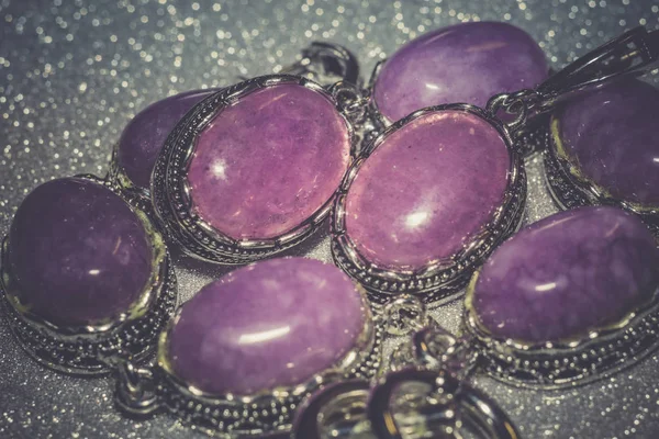 Vintage silver jewelry with purple pink stone, kunzite, agate or quartz, filtered.