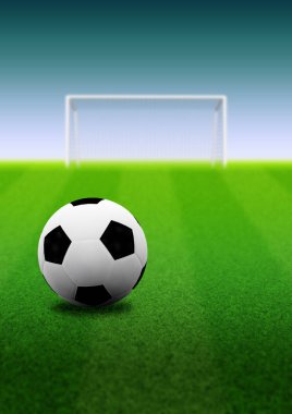 Futbol ya da futbol topu ve çim alan resimde kalede.
