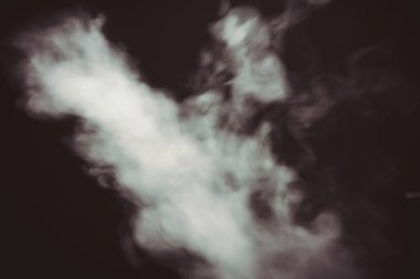 Sıcak karanlık odada buhar akış arka plan filtre.