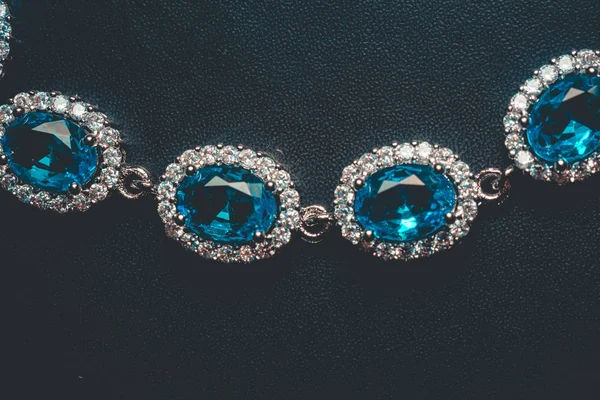 Fashion silver bracelet with blue violet stone, tanzanite imitation.