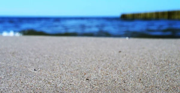 Strandbakgrunnssonen Med Sand Himmel – stockfoto