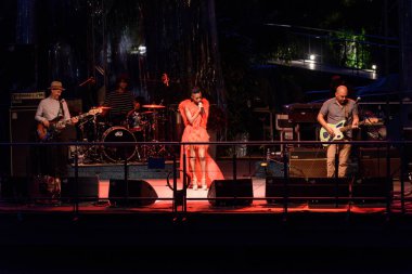 Merano / Meran, Italy - August 2, 2018: , Morcheeba, live concert. The famous trip hop band performs live. clipart