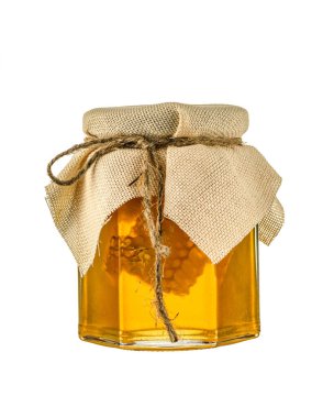 Bal kavanozu yakın plan çekimde, sicimle bağlanmış, beyaz arka planda izole edilmiş.