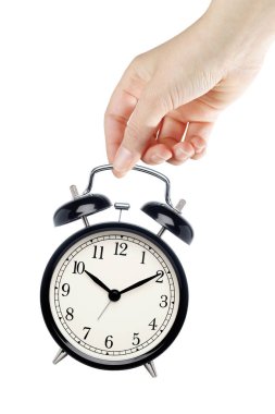 Çalar saat üzerinde beyaz izole tutmak el