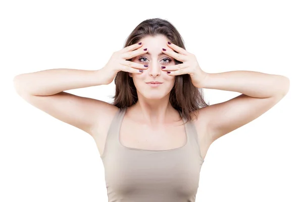 Beautiful young caucasian woman doing face yoga pose — Stock Photo, Image