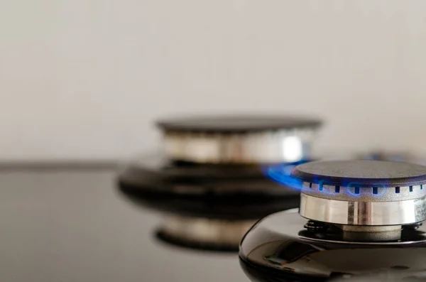 Two Gas Burners Flame One Them Kitchen Stove Blurred Light — Stock Photo, Image