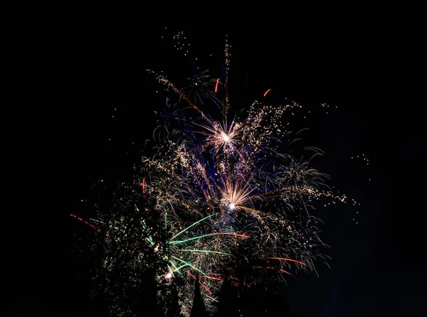 Colorful fireworks in the night sky — Stock Photo, Image