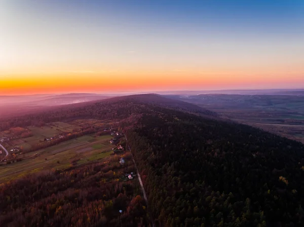 Mountain forest, aerial photography sunset